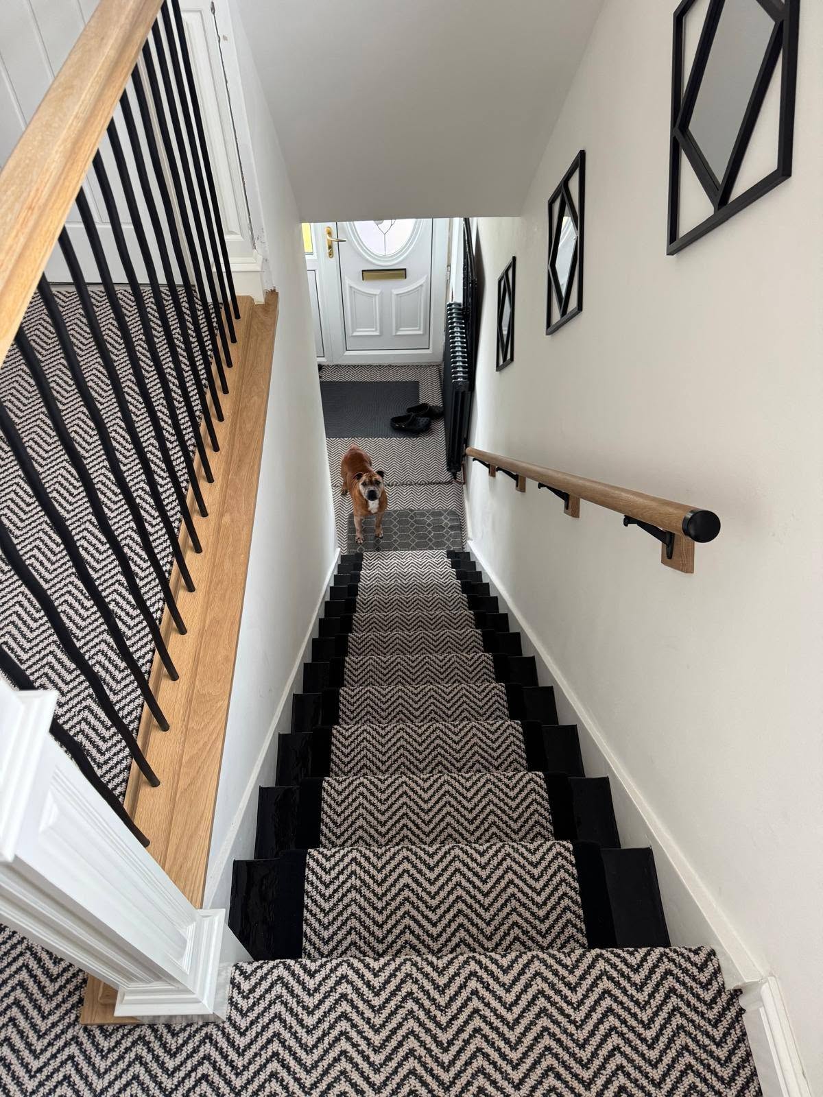 Finished Elite staircase renovation showing the completed joinery and hallway transformation