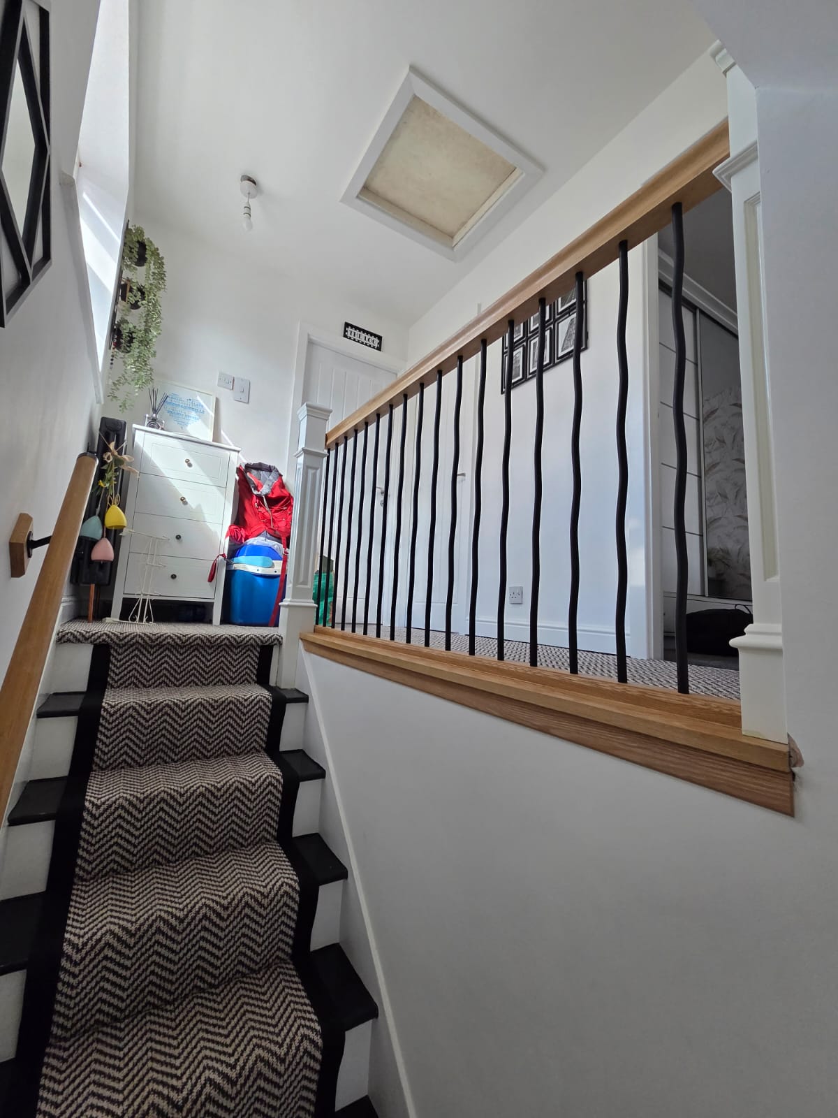Additional completed staircase renovation by Elite showing bespoke joinery and hallway details